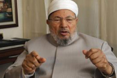 القرضاوي يفر من الكويت بسبب غضب الكويتيين منه