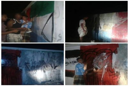 شباب منطقة روكب بمدينة المكلا يمسحون علم العصبة الحضرمية من على جدران منازلهم‎